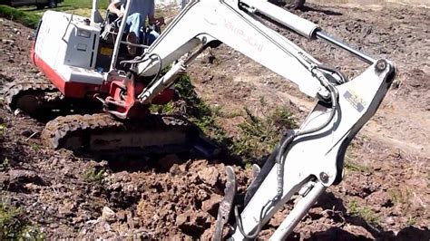 mini excavator on steep slope|mini ex drive up slope.